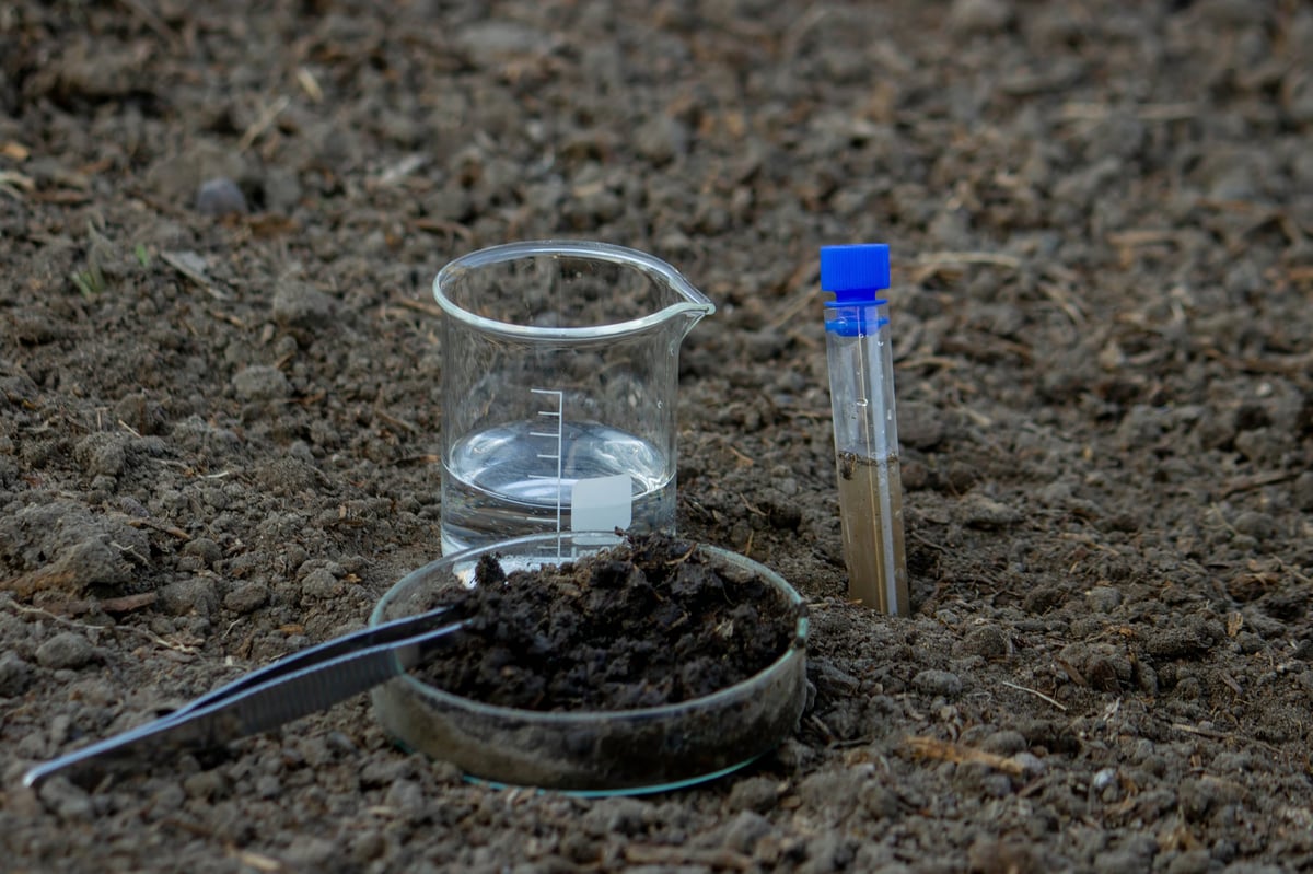 Soil Analysis with Laboratory Equipment Outdoors.